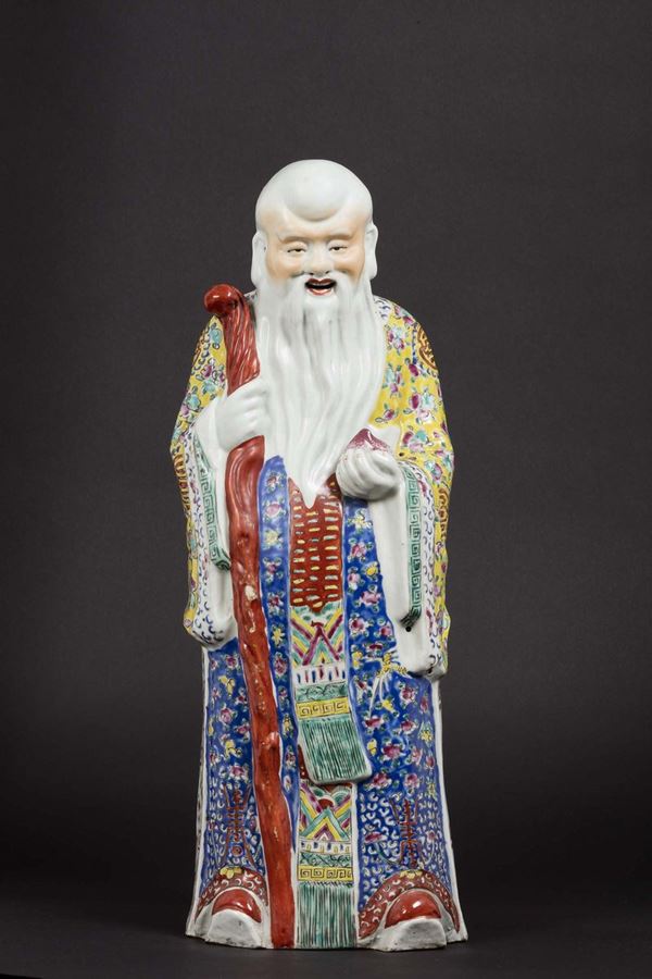 Figura di Shoulao con bastone in porcellana a smalti policromi, Cina, inizio XX secolo