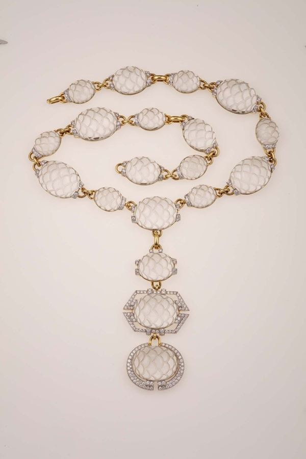 Rock crystal and diamond parure. Comprising a necklace, a bracelet and a pair of earrings. Signed David  [..]