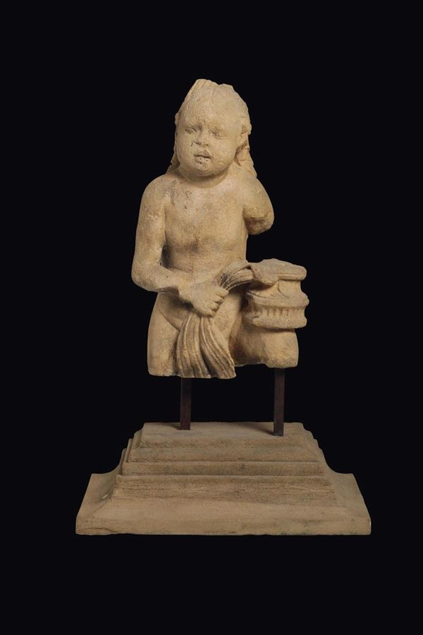 A cherub torso in stone. Tuscan Renaissance lapidary active in the second half of the 15th century