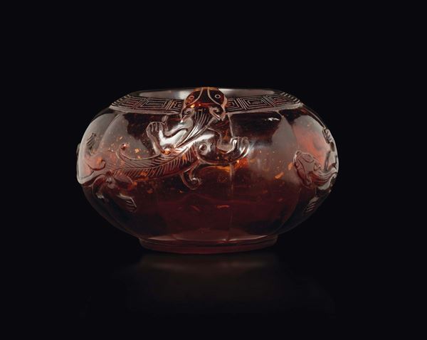 An amber brush washer with a dragon decor, China, Qing Dynasty, 19th century