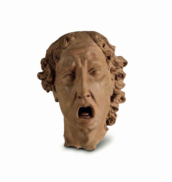 A screaming head (Saint John the Evangelist?) in terracotta. Emilian modeller active in the second half of the 17th century, close to Leonardo and Domenico Reti