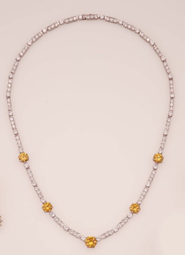 Fancy yellow diamond, diamond and gold necklace