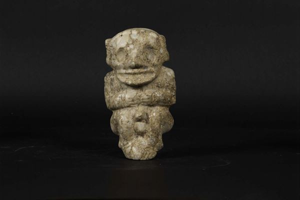 A hermaphrodite figure in jade with incorporations, China, likely from the Neolithic period