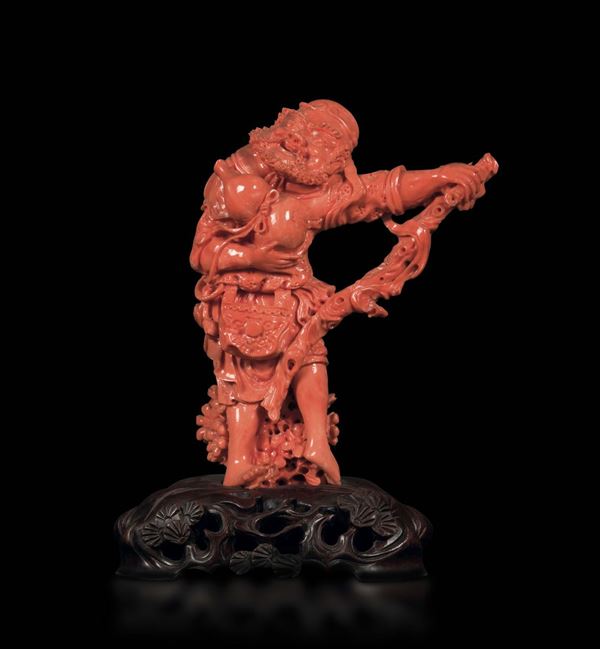 A carved coral figure of a wiseman, China, early 20th century