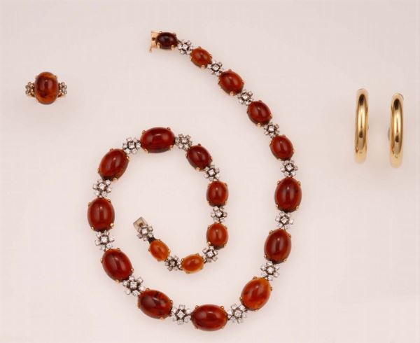 Amber and diamond demi-parure and a pair of gold earrings