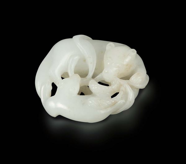 A carved white jade group with tigers, China, Qing Dynasty, 19th century
