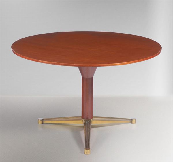 A table with a wooden structure and top. Brass stand. Italy, 1950 ca.