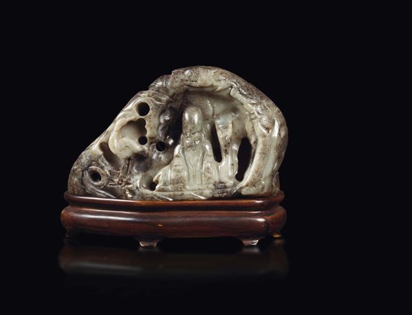 A group in grey and russet jade depicting Shoulao and cranes in a landscape, China, Qing Dynasty, 19th century