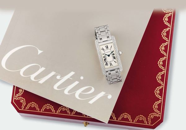 Cartier, Ref. 1713, Tank Americaine. Fine and elegant, 18K white gold and diamonds, quartz lady's wristwatch with gold bracelet with original deployant clasp. Accompanied by the original box and Guarantee. Sold in 2004