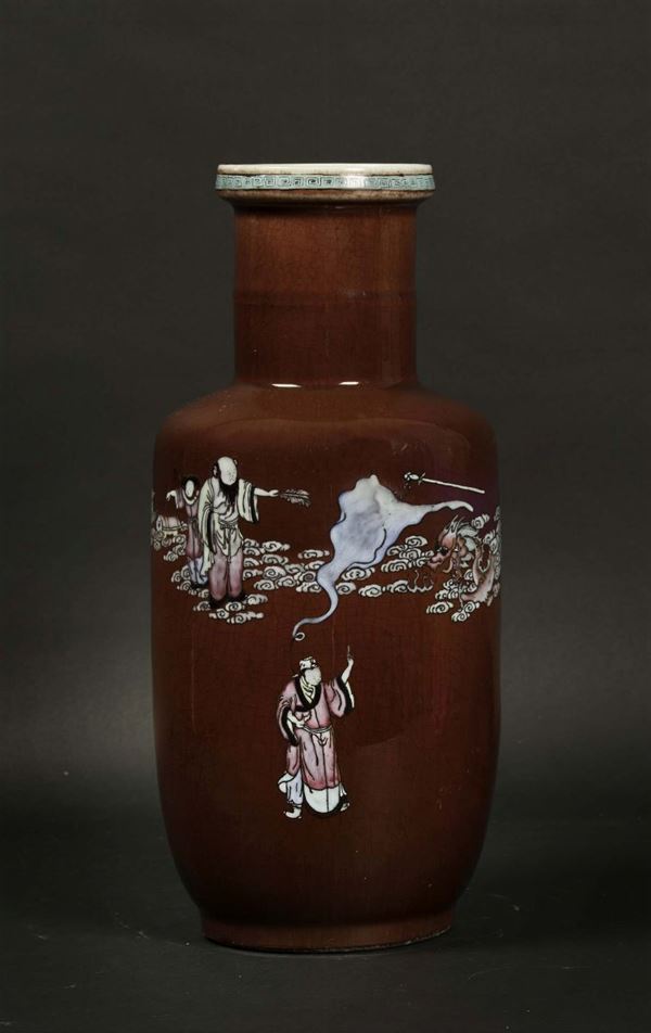 An oxblood porcelain vase with polychrome enamels depicting wisemen, China, Qing Dynasty, 19th century