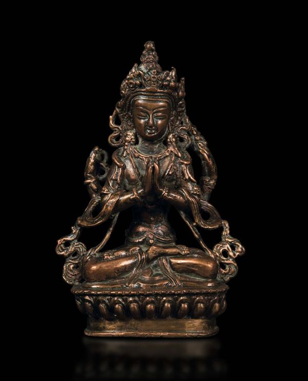 Figura di Avalokitesvara seduta su fiore di loto in bronzo, Tibet/Nepal, XV secolo