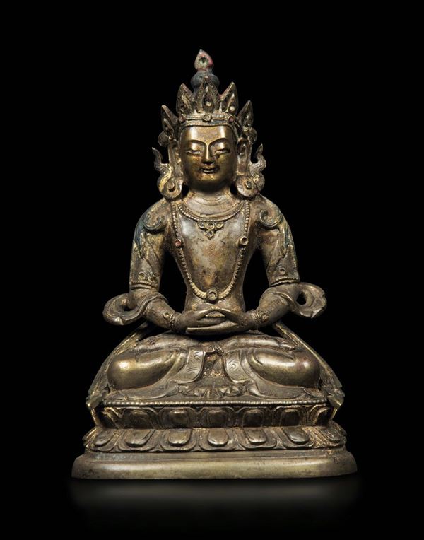 A gilt bronze figure of Amitayus seated on a double lotus flower, China, Qing Dynasty, Qianlong period (1736-1796)