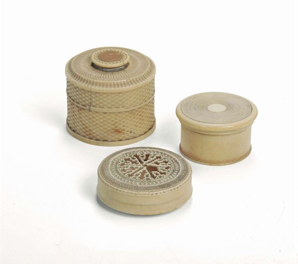A group of three round boxes in carved ivory. Germany, 17th - 18th century