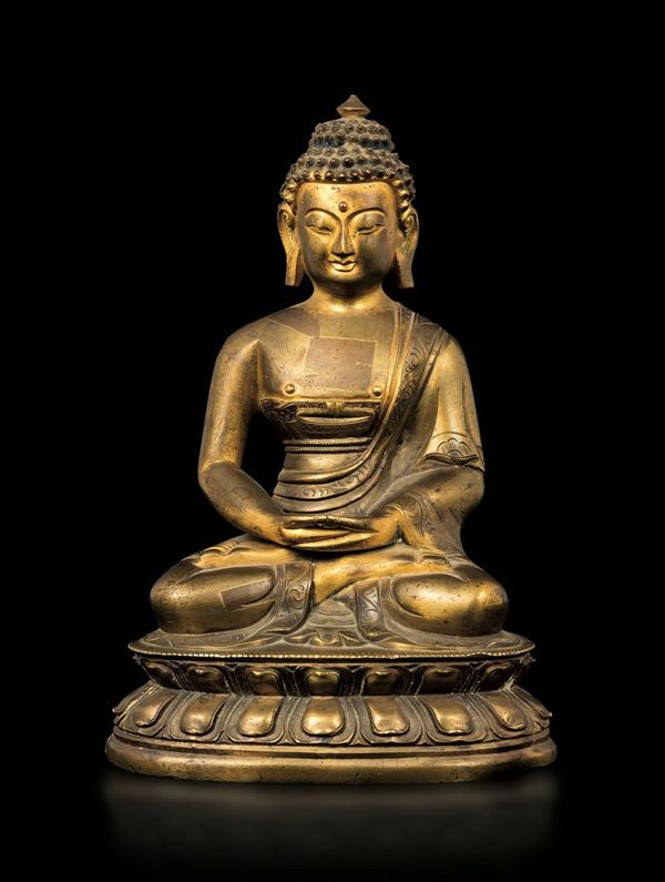 A gilt bronze figure of Amitayus seated on a double lotus flower, China, Qing Dynasty, 18th century