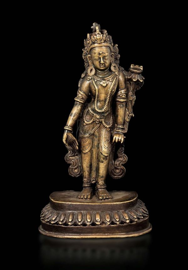 A bronze figure of Padmapani standing on a lotus flower, Nepal, 15th-16th century