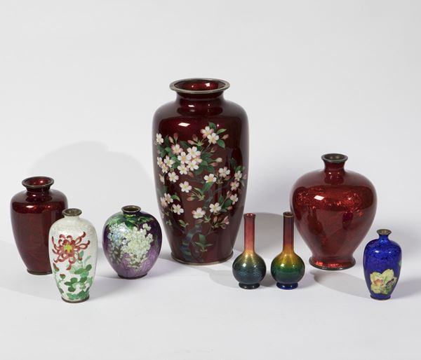 Eight vases in enamelled silver, early 20th century