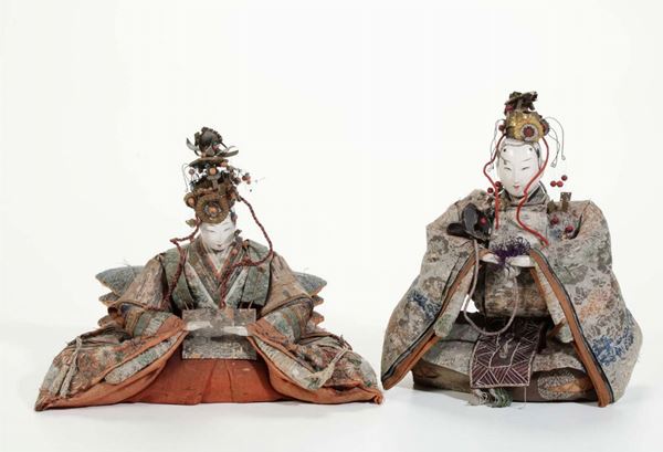 Due bambole con visi in porcellana, Cina XX secolo