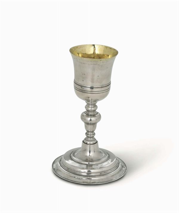 An embossed and engraved silver goblet. Italian manufacture (?), 18th-19th century, unidentified mark