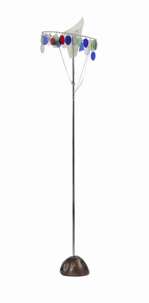 Tony Cordero, a mod. Sibari floor lamp with a chromed metal structure and glass elements. Molten bronze base. Artemide Prod., Italy, 1990 ca.