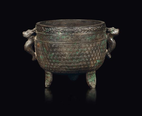 A bronze censer with geometric motifs and dragon head handles, China, Qing Dynasty, Guangxu period (1875-1908)
