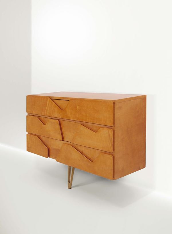 Gio Ponti, a wooden chest of drawers with brass stands. Original design for the Hotel Royal in Naples.  [..]