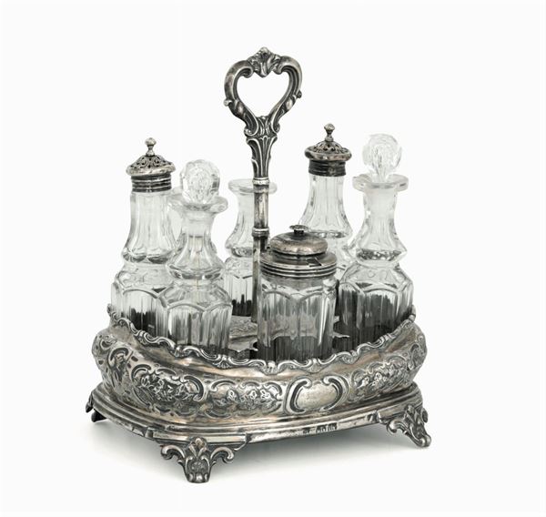 A cruet in molten, embossed and chiselled silver and glass. London 1846, silversmith J. Evans