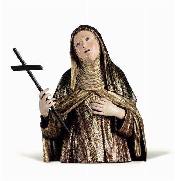 A bust of Saint Theresa of Avila in gilt and polychrome wood, Spanish art from the 17th century. Circle of Luisa Roldan (Seville 1652 - Madrid 1706)