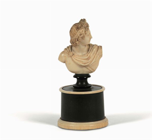 An ivory bust of Apollo. France, second half of the 18th century. Signed Rosset in Saint Claude 1771