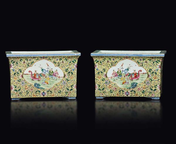 A pair of porcelain flower pots with scenes of playing children and floral decors, China, Republic, 20th century