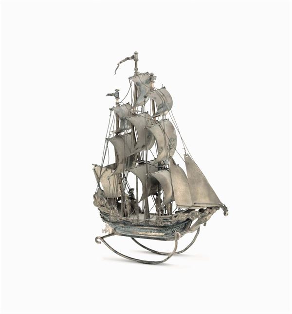 A model of a sailing ship in molten, embossed, chiselled and perforated silver. The Netherlands, 20th century