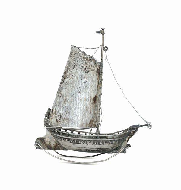 A model of a schooner in molten, embossed, chiselled and perforated silver. The Netherlands, 20th century