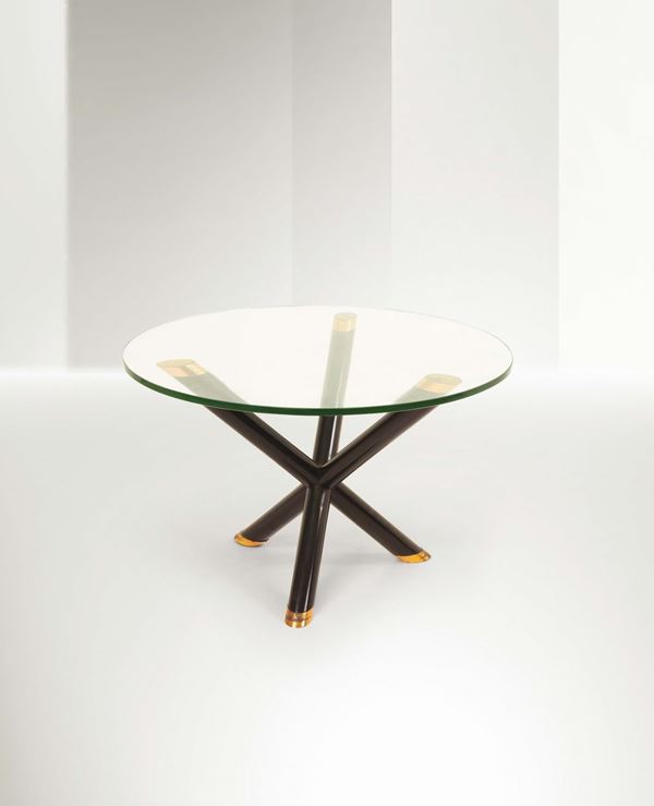 Pietro Chiesa, a table with lacquered wood stands and coppered metal details. Thick cut glass top. Fontana Arte Prod., Italy, 1938