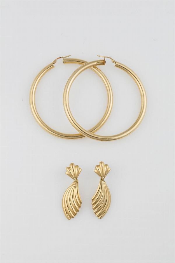 Two pair of gold earrings