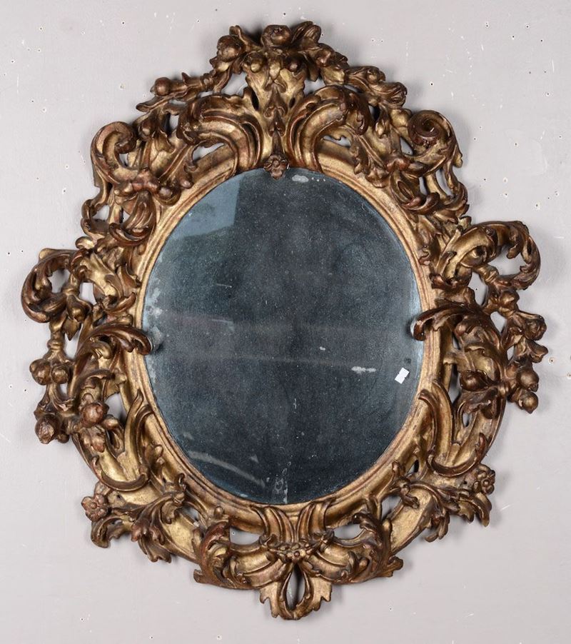 Specchiera in legno intagliato, traforato e dorato, XVIII secolo  - Asta Antiquariato - I - Cambi Casa d'Aste
