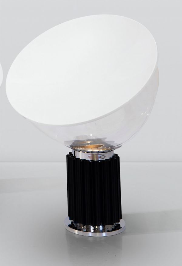 Achille and Pier Giacomo Castiglioni, a Taccia lamp in extruded aluminum with a varnished metal reflector and a swiveling shade in mouth-blown translucent glass. Polished and nickeled steel base. Flos Prod., Italy, 1962
