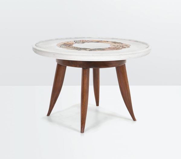 Kovach, a low table with a wooden structure and marble top with inlays. Italy, 1950 ca.