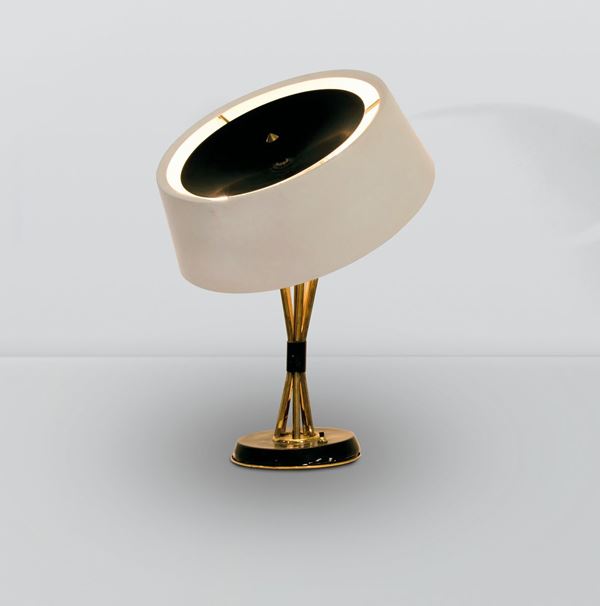 Oscar Torlasco, a table lamp with a brass structure and lacquered metal shade. Lumi Prod., Italy, 1950 ca.