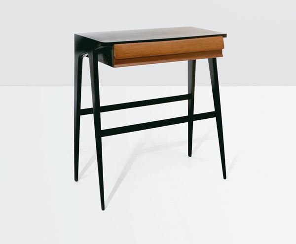 A console table with an ebonised wood structure. Italy, 1950 ca.