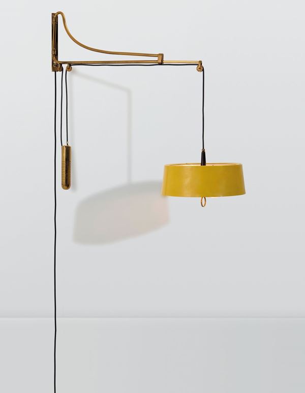 Oscar Torlasco, a wall lamp with an extendable brass structure and lacquered aluminum shade. Original label, Lumi Prod., Italy, 1950 ca.