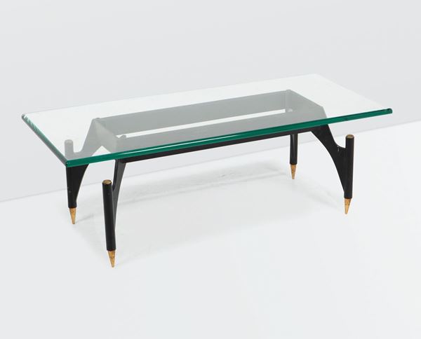 Max Ingrand, a 2013 low table with a lacquered brass and polished brass base. Thick cut glass top. Fontana Arte Prod., Italy, 1960 ca.