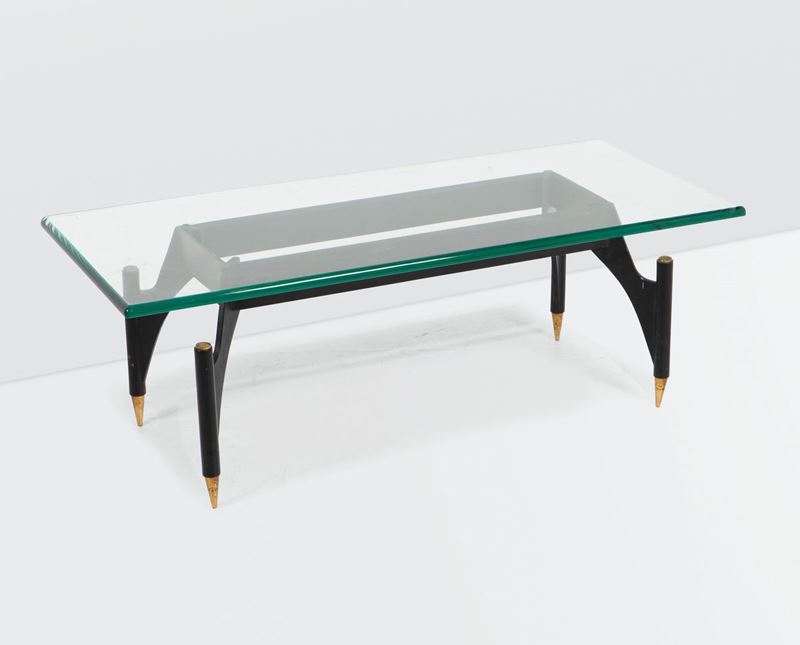 Max Ingrand, a 2013 low table with a lacquered brass and polished brass base. Thick cut glass top. Fontana Arte Prod., Italy, 1960 ca.  - Auction Design 200 - Cambi Casa d'Aste