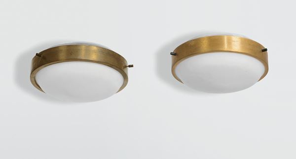 Gino Sarfatti, a pair of plafond lights with a brass structure and satinised glass shades. Arteluce Prod., Italy, 1950 ca.