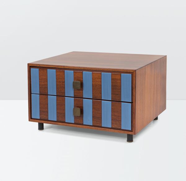 Ettore Sottsass, a wood and lacquered wood sideboard. Brass details and lacquered metal stands. Poltronova  [..]