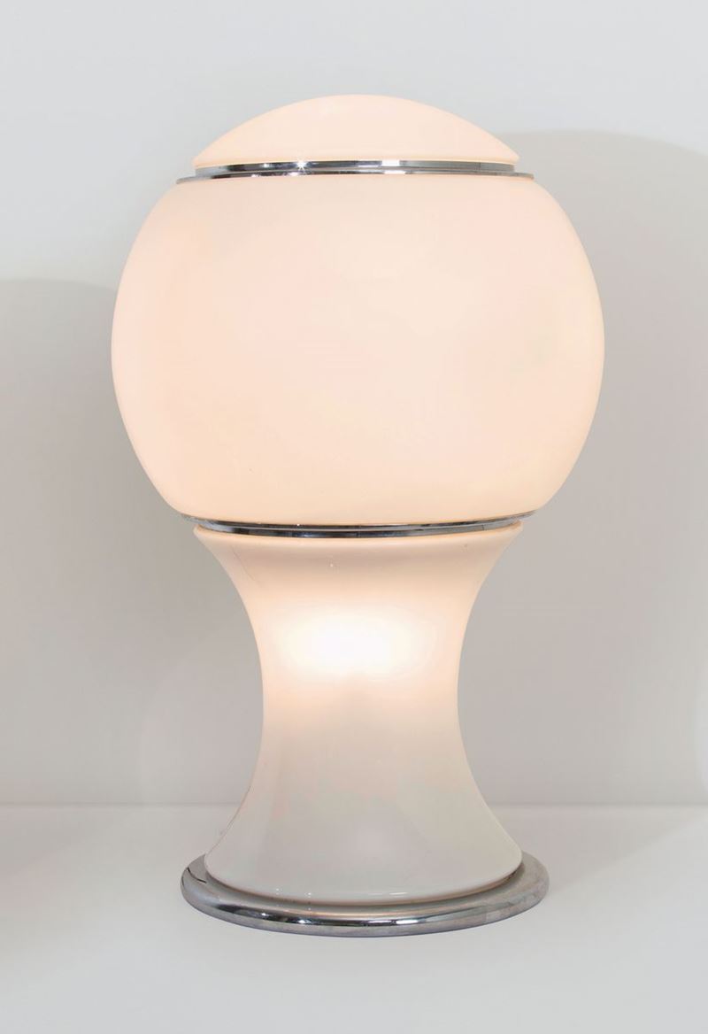 Gianni Celada, a Mongolfiera table lamp in bright white glass with chromed brass bands. Fontana Arte Prod., Italy, 1968  - Auction Design 200 - Cambi Casa d'Aste