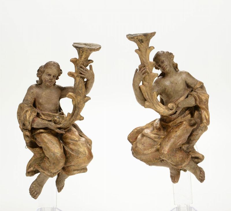 Coppia di angeli reggicero in legno intagliato, laccato e dorato, XVIII-XIX secolo  - Auction Works of Art Timed Auction - IV - Cambi Casa d'Aste