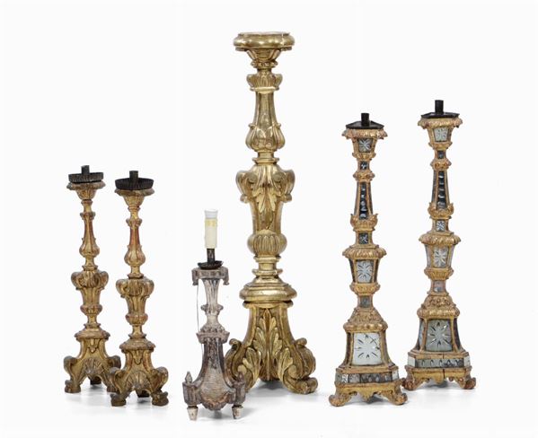 Lotto di sei candelieri in legno intagliato, XVIII-XIX secolo