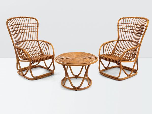 Tito Agnoli, a set of wicker furniture made up by two chairs and a table. Bonacina Prod., Italy, 1960 ca.