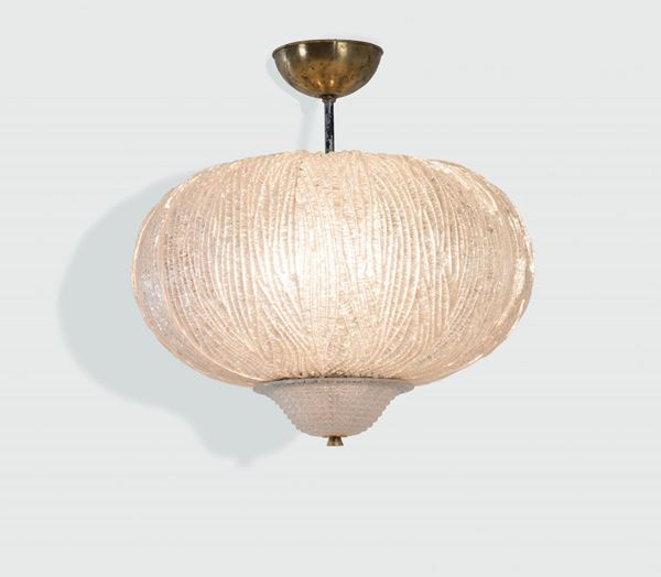 Barovier and Toso, a pendant lamp with a brass structure and Rugiada glass shade. Barovier&Toso Prod.,  [..]