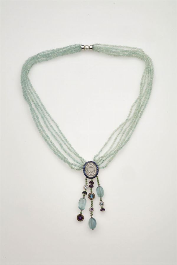 Collana composta da cinque fili di acquamarina con parte centrale con gemme multicolor e perla coltivata