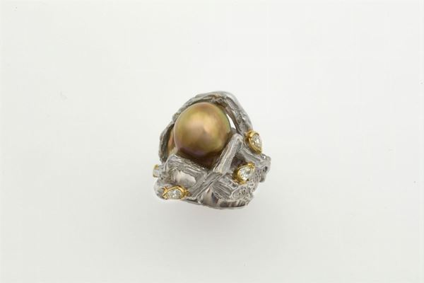 Cultured pearl and diamond ring. Signed Enrico Cirio
